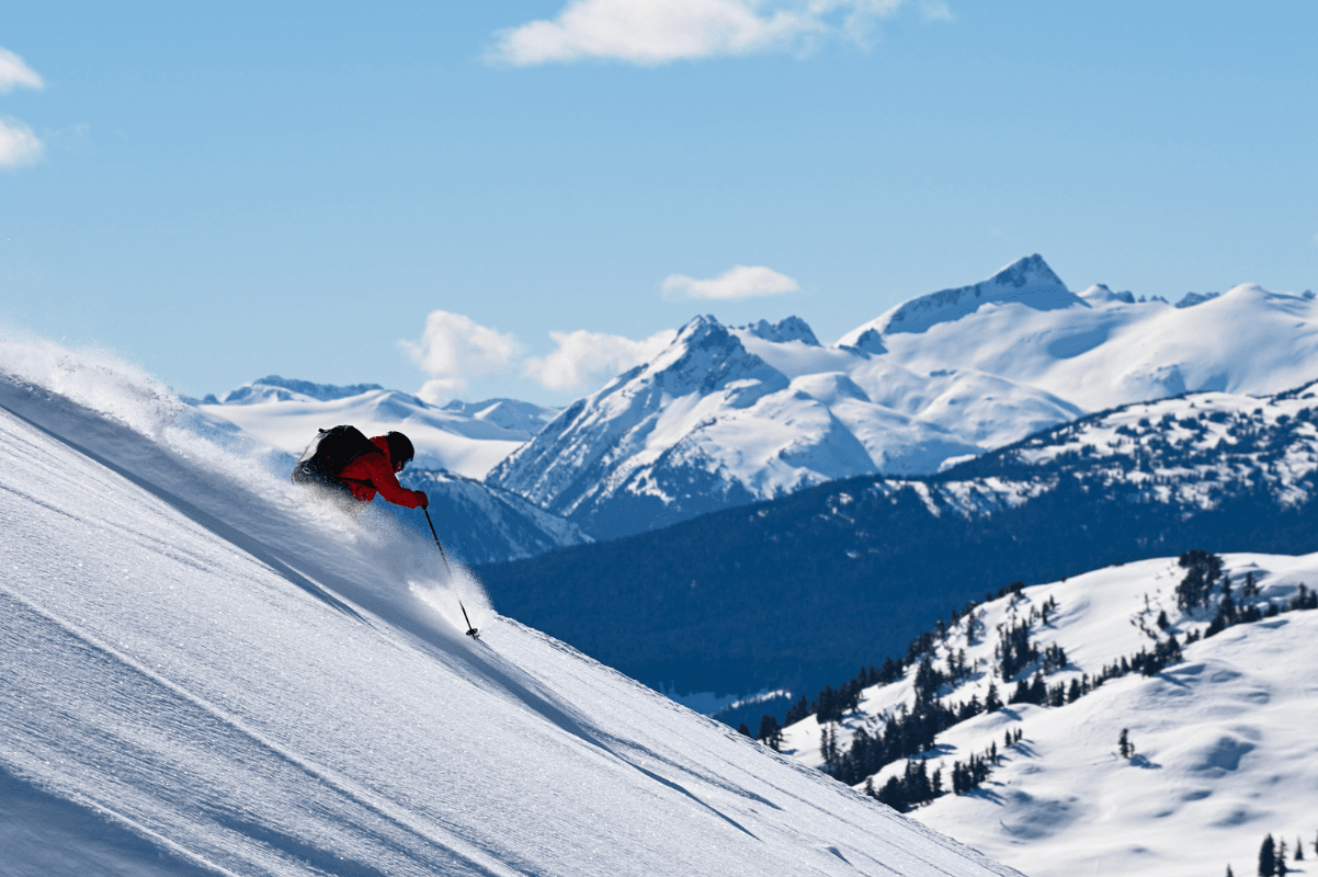 Skiers enjoying Whistler powder snow